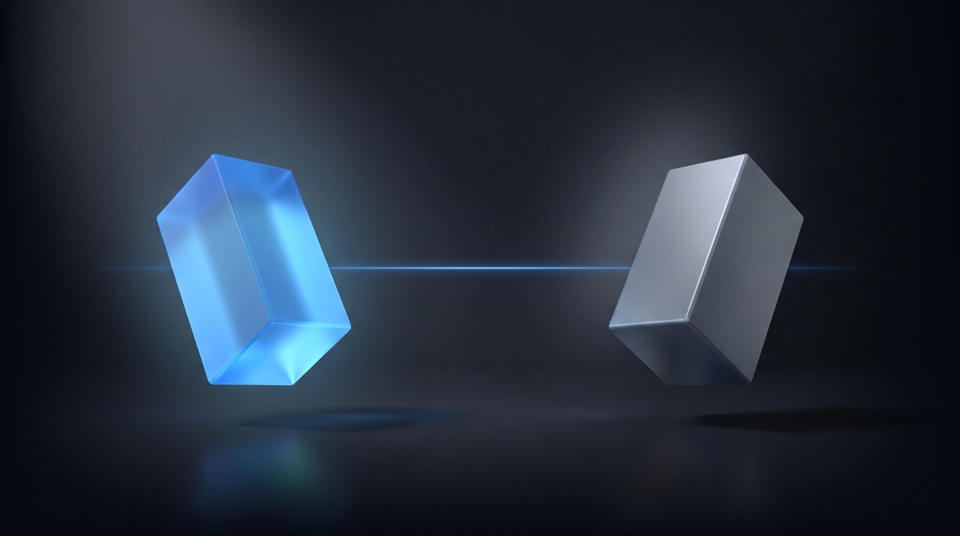 Two geometric prisms - one blue, one gray - face each other against a dark slate backdrop.